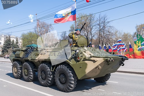 Image of Armored personnel transporter with commander