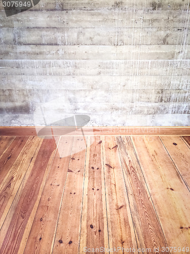 Image of Interior with wooden floor and concrete wall