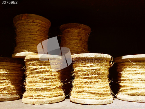 Image of Old wooden twine bobbins