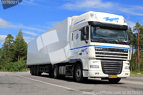 Image of White DAF XF 105 Semi Truck Parked in Summer