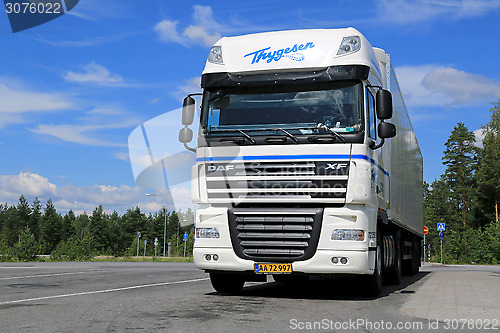 Image of White DAF XF 105 Semi Truck Parked in Summer