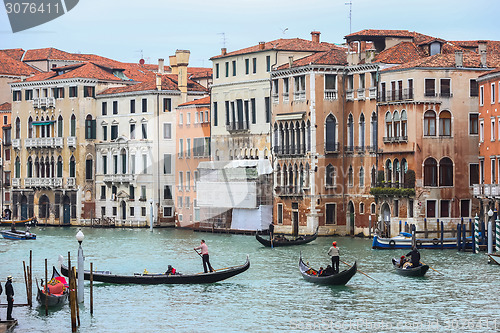 Image of Water canal with gondolas in Venice
