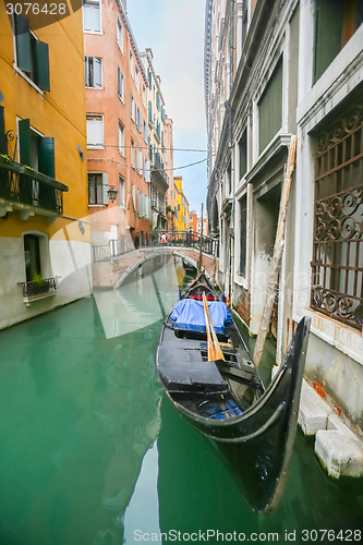 Image of Empty gondola parked in front of house 