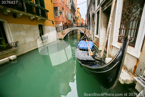 Image of Gondola parked in front of building