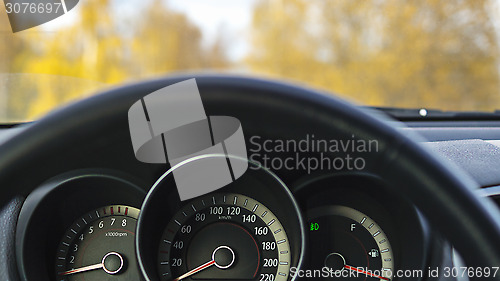 Image of Car steering wheel in autumn