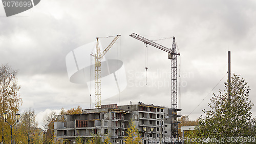 Image of Cranes on construction site of building