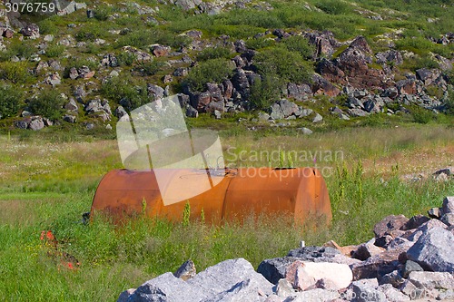 Image of empty barrels in the Arctic environmental pollution