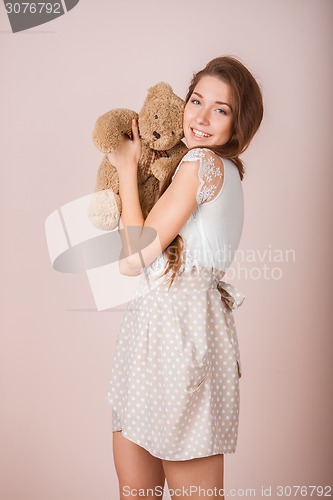 Image of Girl and teddy bear