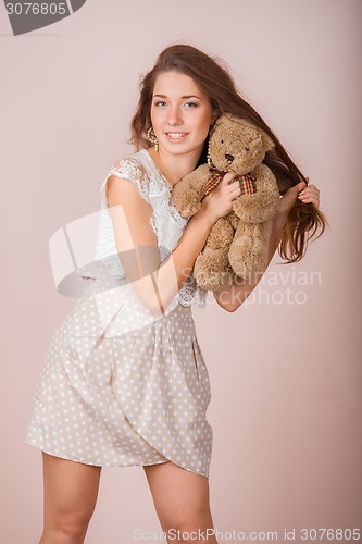 Image of Girl and teddy bear