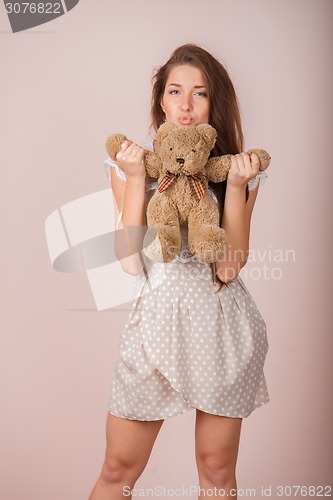 Image of Girl and teddy bear