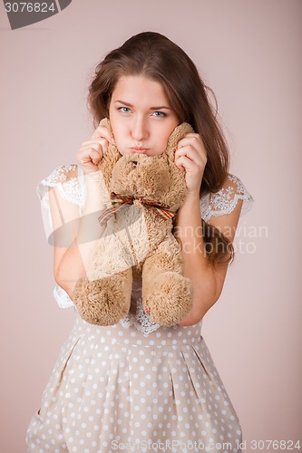 Image of Girl and teddy bear