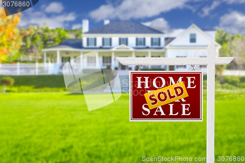 Image of Sold Home For Sale Sign in Front of New House