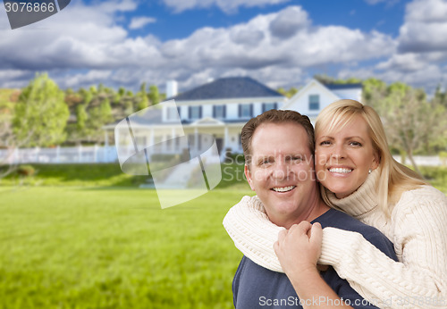 Image of Happy Caucasian Couple Hugging In Front of House