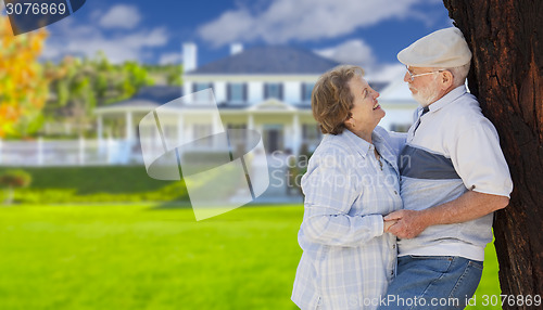 Image of Happy Senior Couple in Front Yard of House