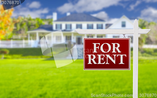 Image of For Rent Real Estate Sign in Front of House