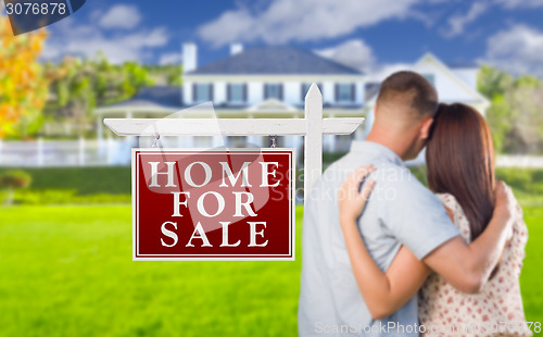 Image of For Sale Real Estate Sign, Military Couple Looking at House