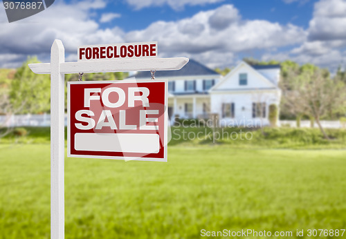 Image of Foreclosure Home For Sale Sign in Front of Large House