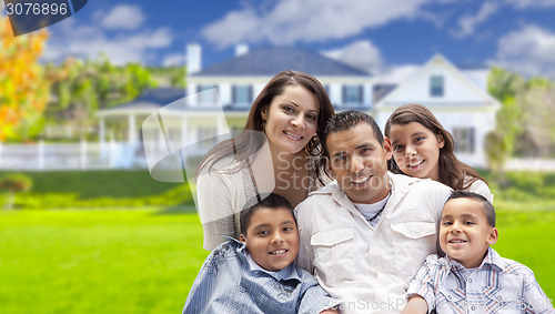 Image of Young Hispanic Family in Front of Their New Home