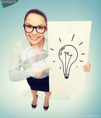 Image of smiling businesswoman with white board