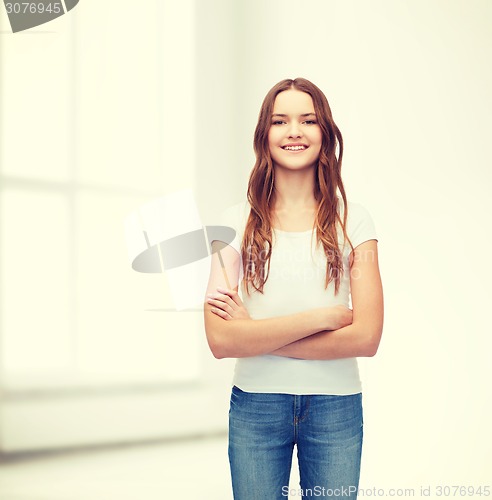 Image of smiling teenager in blank white t-shirt