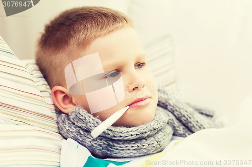 Image of ill boy with flu at home