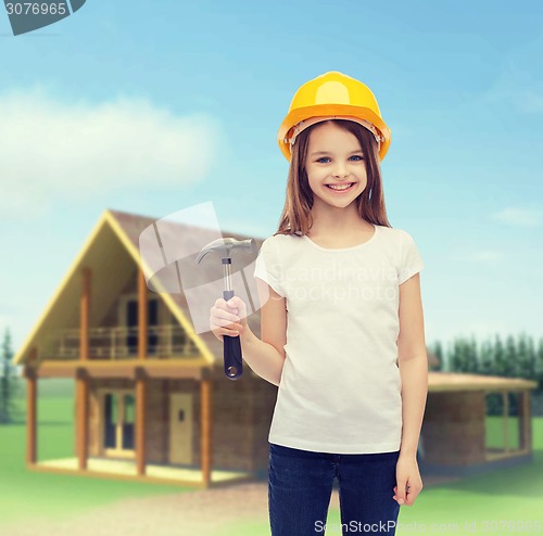 Image of smiling little girl in protective helmet