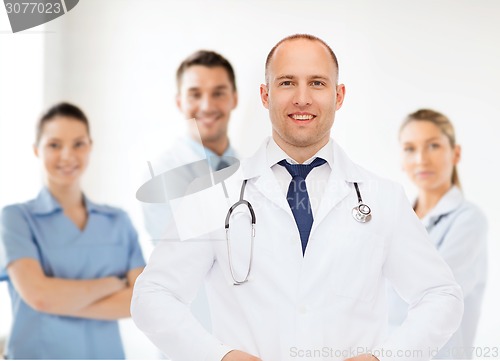 Image of smiling male doctor with stethoscope