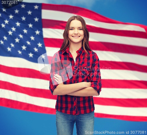 Image of smiling young woman in casual clothes