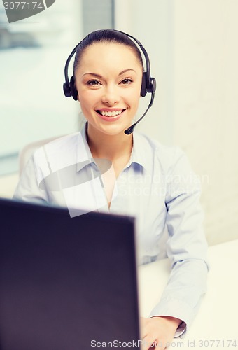 Image of friendly female helpline operator