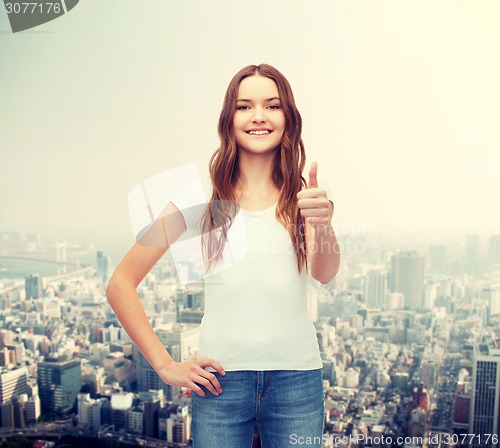 Image of smiling teenager in blank white t-shirt