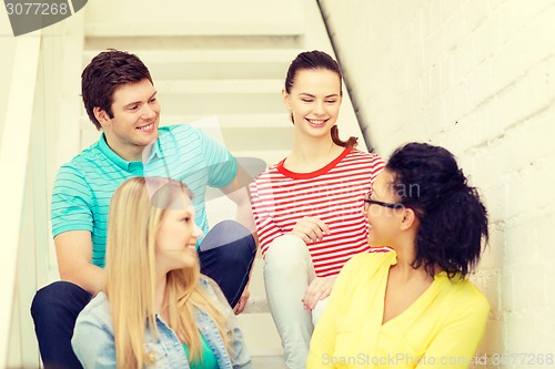 Image of smiling teenagers hanging out