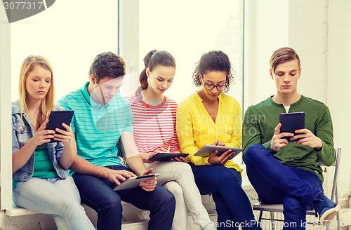 Image of smiling students with tablet pc computer