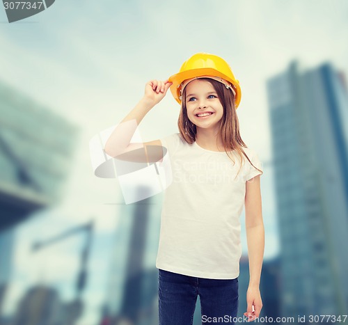 Image of smiling little girl in protective helmet