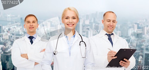 Image of group of doctors with stethoscopes and clipboard