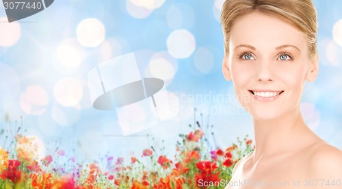 Image of close up of smiling woman over natural background