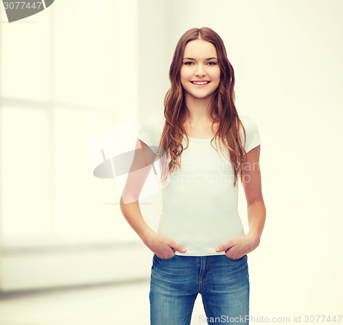 Image of smiling teenager in blank white t-shirt