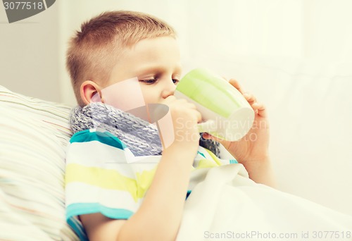 Image of ill boy with flu at home