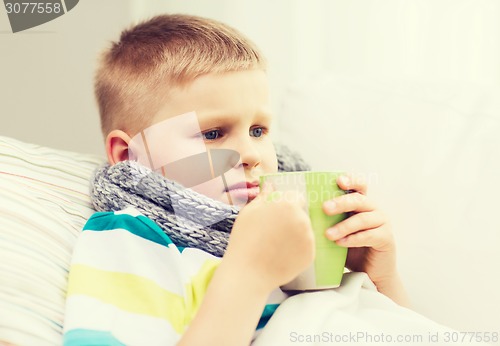 Image of ill boy with flu at home