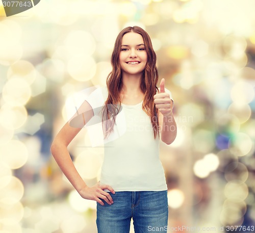 Image of smiling teenager in blank white t-shirt