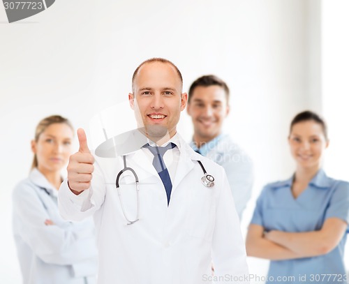 Image of smiling male doctor with stethoscope