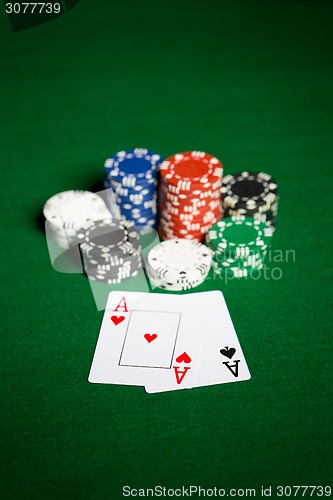 Image of close up of casino chips and playing cards