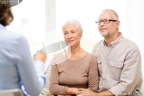 Image of happy senior couple at home