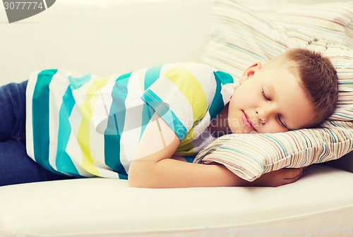 Image of little boy sleeping at home
