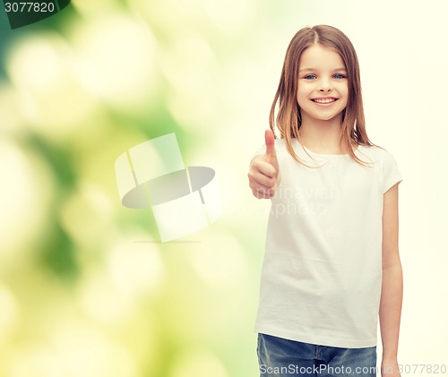 Image of girl in blank white t-shirt showing thumbs up