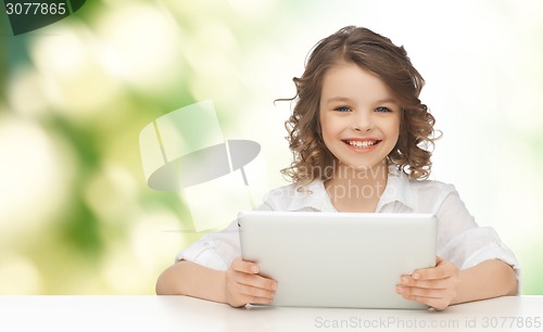 Image of happy smiling girl with tablet pc computer