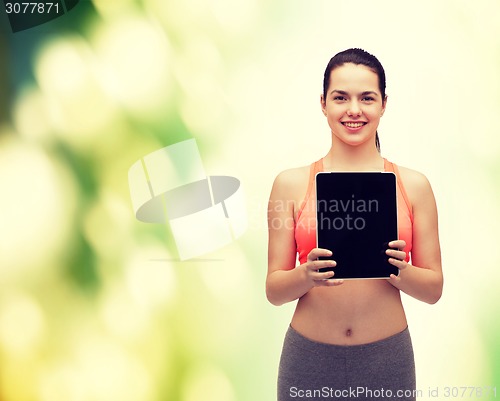 Image of sporty woman with tablet pc blank screen