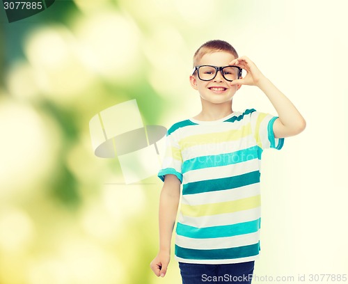 Image of smiling little boy in eyeglasses