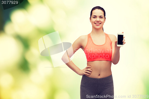 Image of sporty woman with smartphone