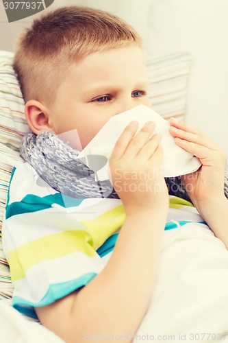 Image of ill boy with flu at home