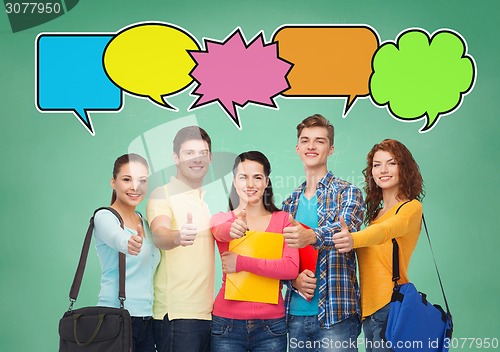 Image of group of smiling students showing thumbs up